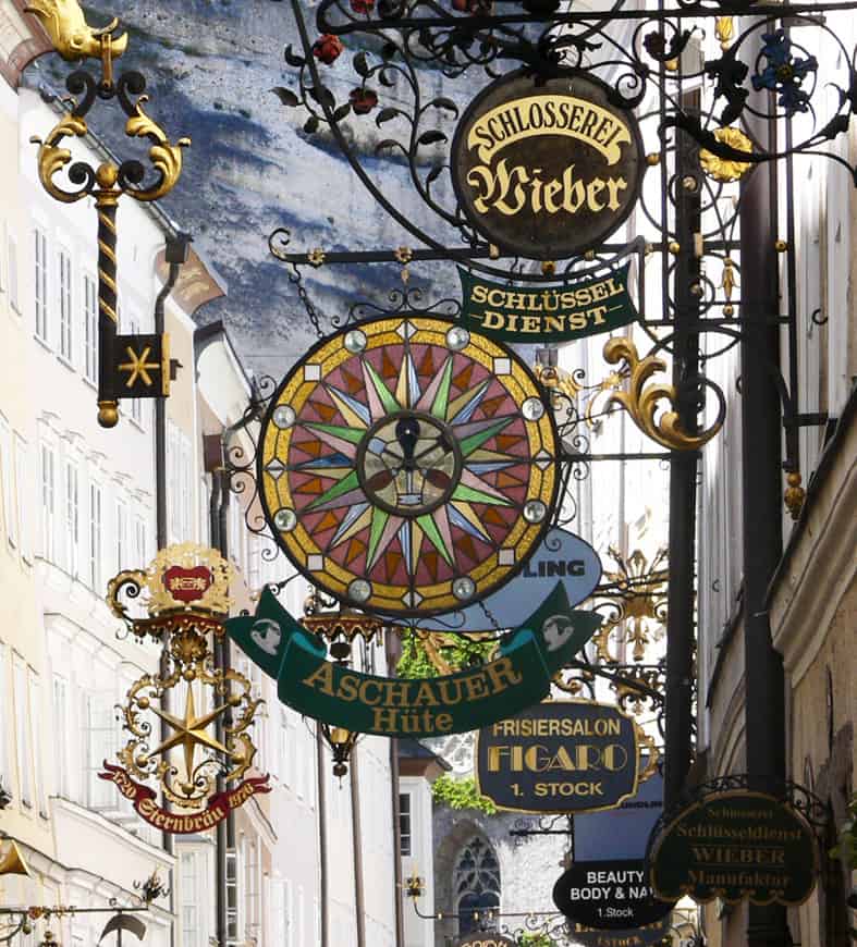 Medieval looking signs in the Getreidegasse in Salzburg