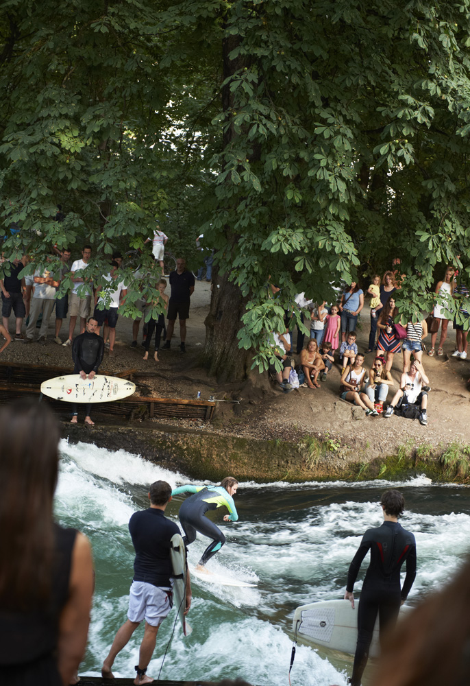 People watching the Munich surfers in the English Garden